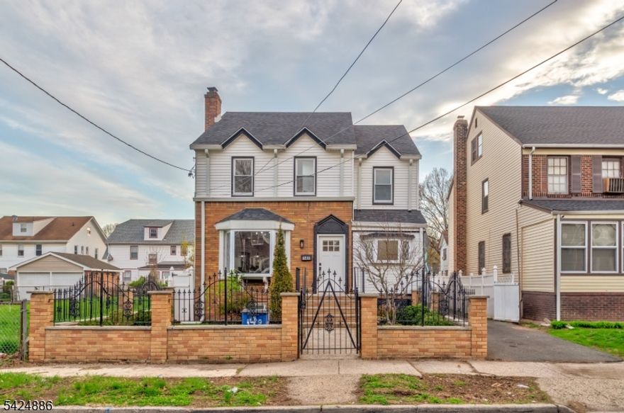 Welcome to 148-150 Hansbury Ave, a beautifully renovated home just steps from scenic Weequahic Park, offering 4 spacious bedrooms, 1 full bath, and 2 half baths, along with a fully finished basement with washer and dryer connection for added convenience. The first floor features high ceilings and a bright, open layout with a welcoming living room, formal dining room, modern kitchen with updated finishes, and an additional versatile room perfect for a home office, den, or guest space. The second floor offers three generously sized bedrooms, including a primary suite with his-and-hers closets and a full bath, while the finished attic serves as a fourth bedroom with additional closet space, ideal for extra living or privacy. Sliding windows throughout provide abundant natural light, enhancing the home's airy feel. Exterior features include a full garage, private driveway, and a spacious deck perfect for entertaining or relaxing. Located in the highly sought-after Weequahic Park neighborhood, this move-in-ready home offers easy access to parks, schools, shopping, and public transportation, making it a perfect blend of comfort, style, and convenience.