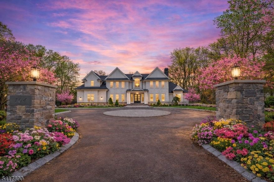 Welcome to this stunning, newly built, Custom, luxury home on a 2.06 Acre Corner lot, offering 10,432 sf of finished space. 6,832sf of living space + 3,100sf fully finished basement and a 500sf accessory structure. Total of 5 bedrooms and 7.5 bathrooms, including 1st and 2nd floor primary suites plus 3 en-suite bedrooms. Radiant heat throughout the entire home including the 4 car garage! total of 13 zones + 5 zone central air. 7 inch engineered white oak floors, custom cabinetry & 4 fireplaces. Gourmet kitchen with Sub Zero appliances, rangecraft hood, double island. Soaring ceilings 10 ft first floor, 9 ft second floor & basement. Outdoor kitchen, 400 amp underground electric, new well & septic. Attached 4 car garage with 13 ft ceilings, 2 driveways, 10,000sf of Belgian block driveway. A true masterpiece blending luxury, comfort & sophistication.