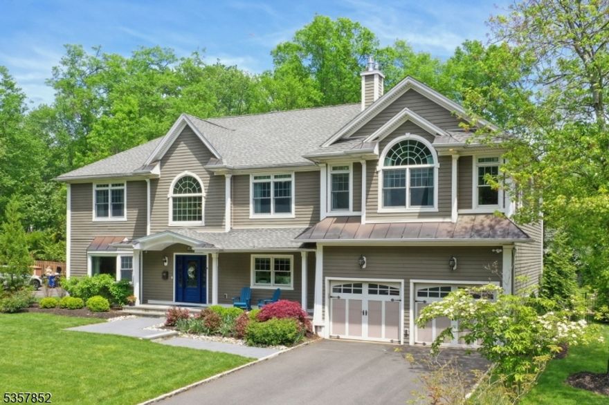 Welcome to this exquisite home where luxury meets comfort. Boasting 6 spacious bedrooms and 5.1 meticulously designed bathrooms, it is a masterpiece of design and functionality. You're greeted by elegance & sophistication as you enter through the grand 2-story foyer, which leads to a spacious and bright dining room on one side, while the living room is straight ahead. The open chef's kitchen features custom-made cabinets, granite countertops & top-of-the-line stainless steel appliances. The kitchen flows into the breakfast room, offering direct access to the patio and a personal resort-like oasis. A guest bedroom, full bath, a convenient home office, and a powder room complete this level. Upstairs, the primary suite is a luxurious sanctuary featuring a gas fireplace, tray ceiling, walk-in closet, & a spa-like ensuite. Four additional bedrooms, two with ensuite baths and two with a Jack and Jill bath, plus a laundry room, are also located on this level. The finished attic and basement offer extensive flex space. Outside, the multi-level patio features a fiberglass pergola, a built-in fireplace, and a built-in kitchen. The heated in-ground pool and pool house with outdoor shower offer a refreshing escape. Additional features in this home include extensive moldings, Brazilian Cherry wood floors, built-in sound system, security system, composite siding, 2-car attached garage with 1st-floor entry, underground sprinkler system, mature landscaping & dramatic outdoor lighting.