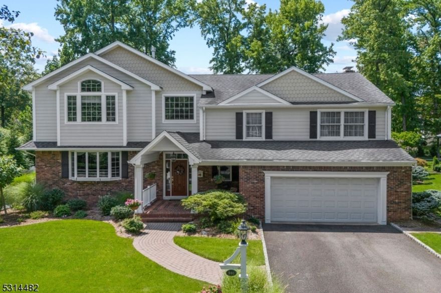 Welcome to this stunning 5-bedroom, 4.5-bath CUSTOM home, set on a sprawling & beautifully landscaped property. As you enter, you're greeted by a grand foyer that sets the tone for the rest of the home. At its heart lies a gorgeous EIK, complete with a center island, S/S appliances & ample counter space. Adjacent to the EIK, you'll find a sun-filled formal LR with a charming bay window and a sophisticated formal DR, perfect for hosting gatherings. The expansive family room features custom built-ins & a cozy gas fireplace with a sunroom just steps away. The 1st floor is rounded out with a convenient mudroom, laundry room & powder room. Upstairs, you'll discover three generously sized BR's that share a full bath, along with a spacious ensuite bedroom w/abundant closet space & a luxurious full bath. The 3rd floor is dedicated to the primary suite a true retreat with a spa-like bath offering a stall shower, jetted tub, a massive WIC & a sitting area overlooking the expansive backyard oasis. The finished lower level offers endless possibilities, featuring a full bath, rec. area, bonus room for an office or gym, and plenty of storage. The private backyard sanctuary includes a patio leading to an amazing gunite & heated pool, surrounded by lush landscaping that ensures privacy and tranquility. This exceptional property is just minutes from all schools, vibrant Downtown, picturesque Tamaques Park & NYC transportation. Don't miss the opportunity to make this magnificent home your own!