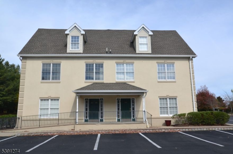 Professional Office suite at 4 Walter E. Foran Blvd.  This second-floor furnished office suite has four offices (16'x10', 14'x9', 13'x9' and 12'x9'); receptionist/support area; kitchen area with refrigerator and a restroom at a low monthly price.  Don't Miss This Opportunity!