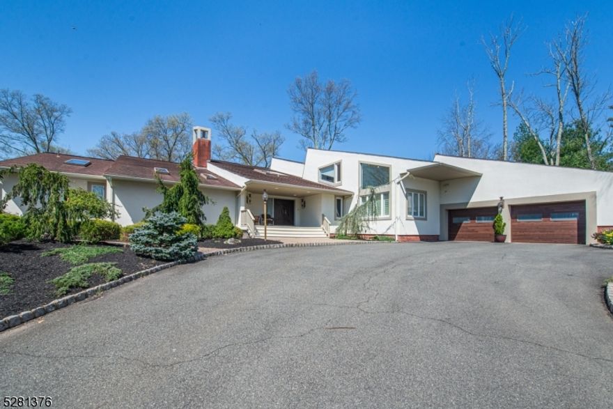 Step into your own private resort at this stunning 1-acre estate in the sought-after Summit Woods!This expansive home boasts 5 beds, including a luxurious primary suite,4 full baths, and 2 1/2 baths, all nestled on a tranquil cul de sac. Say goodbye to power interruptions with the automatic gas generator, and experience ultimate relaxation in the inground, ?wet edge? surface-heated pool?controlled from your phone. Inside, the grandeur continues with a 6-zone HVAC system ensuring comfort, especially in the massive great room adorned with 20' ceilings. Indulge in the opulence of the renovated primary suite, complete with custom closets and built-ins.The primary bath is a spa-like retreat, featuring exquisite Quartzite counters, an oversized shower, and ample storage. The newly renovated gourmet kitchen is a masterpiece, equipped with top-of-the-line Sub Zero fridge and freezer, dual dishwashers, a Thermador range top, and double ovens and custom cabinetry.Illuminate your culinary creations with all-LED lighting, including accent lighting.The home offers 3 addn'l ensuite beds, one of which could serve as an in-law suite with its own liv room. With everything designed on a grand scale, from the oversized 2+ car garage to the expansive rooms, this home is perfect for those who appreciate space and luxury. Enjoy unparalleled privacy as the property backs onto a working farm, offering serene views and seclusion.Don?t miss this rare opportunity to live the resort lifestyle every day.