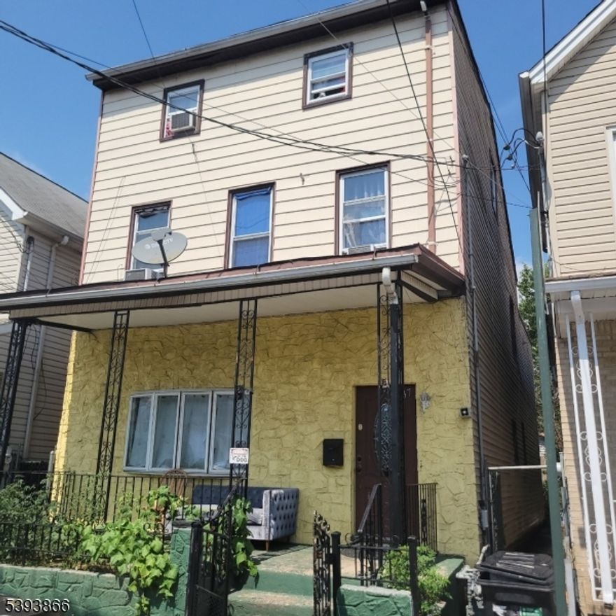 Income-producing, low taxes, three-story, 2-family home, 14 rooms, 6 bedrooms, 4 full baths, partially finished basement with full bath.  Deck off 2nd floor.  Separate utilities.  Close to transportation.