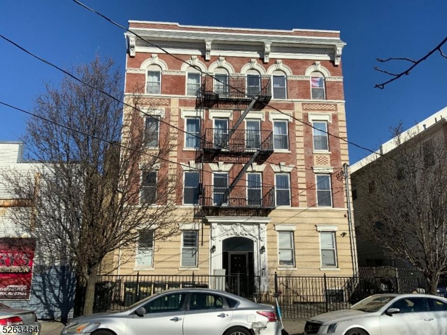 BUILDING FOR SALE LOWER NORTH NEWARK SECTION 12 APARTMENTS , 12- 2 BEDROOMS , LIVING ROOM KITCHEN BATHROOM . BUILDING RENOVATED 2012 AND 4 OUT OF 12 RENOVATED 2023. FLOATING AND CERAMIC FLOORS . ALL SEPERATE UTILITIES ALL UNITS WITH CENTRAL AC/HEAT 13 GAS METERS . 13 ELECTRIC METERS STOVE DISHWASHER INCLUDED . FULL FINISHED BASEMENT WITH UTILITY ROOM AND USED FOR STORAGE FLAT RUBBER ROOF, SPRINKLER SYSTEM  SURVELLIANCE CAMARAS BRICK BUILDING ALL AROUND REAR YARD CONCRETE FLOOR NEAR ROUTE 21 AND BROAD ST LIGHT RAIL STATION MONTHLY GROSS INCOME $ 17,966.30