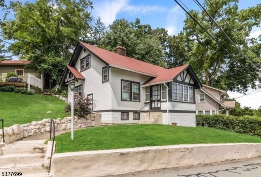 This charming 3-bedroom, 2-bath single-family home, nestled in a quiet Morristown neighborhood, offers old-world character with modern updates. Completely renovated in 2019, the home features a brand-new kitchen, two full baths, cozy sunporch, hardwood floors, stylish lighting, and exposed brick walls that add a designer touch throughout. Main Bedroom with attached bath and separate office/ sitting room. The property is equipped with two energy-efficient Mitsubishi Heat Pumps (mini-splits) for year-round comfort, along with supplemental electric baseboard heating, each room having its own thermostat. For added convenience, a washer and dryer are available in the basement with extra storage space. Located just minutes from downtown Morristown and  the NYC Direct Train, this home offers both tranquility and accessibility. The tenant will be responsible for lawn maintenance. The landlord will provide an electric string trimmer and lawnmower. Snow removal for the sidewalks and steps is the tenant's responsibility, though the landlord will provide a shovel and salt. Pets accepted for an additional fee, plenty of street parking is available with free parking permits from the town. Renters insurance and an NTN report are required. No smoking of any kind in the house. The rest of the pics will be up by Sunday. First 100.00 of repairs are the responsibility of the tenant.