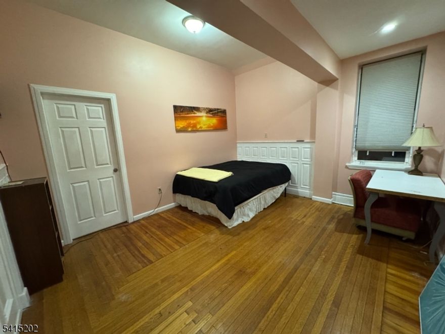 Private room available for rent in a large, well-maintained home located in the North Ward of Newark, just off Bloomfield Avenue. The property features two fully equipped kitchens and five shared bathrooms, providing flexibility and convenience for residents. Rooms may be rented furnished or unfurnished and include access to a shared updated bathroom and eat-in kitchen. Wi-Fi and all utilities are included in the rent. The home is situated within a five-minute walk of multiple NJ Transit bus stops along Bloomfield Avenue, offering access to Downtown Newark, Newark Penn Station, Montclair, and surrounding areas, as well as convenient access to New York City via public transportation and major roadways. The location provides close proximity to grocery stores, restaurants, caf s, pharmacies, and other everyday conveniences, along with nearby access to Branch Brook Park.