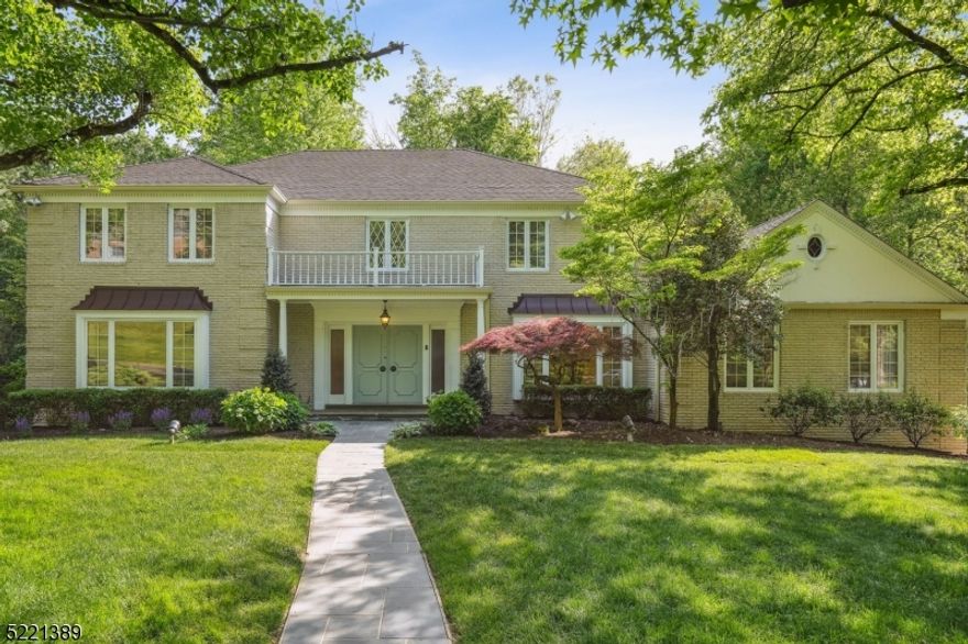 Situated on a half-acre of beautifully landscaped property, this high-end home enjoys a prime spot in the desirable Deerfield neighborhood. This center hall Colonial home features 5 bedrooms, 5.1 bathrooms, is thoughtfully designed, and provides the right flow for seamless indoor /outdoor entertaining.  Enter the home through its elegant double foyer with grand staircase, spacious living room, dining room and sun--filled family room, gorgeous wood paneled library with a fire place, gourmet eat-in kitchen with SS appliances (Thermador, Bosch and Sub-Zero). Walk through the glass door to the adjacent beautiful Brazilian IPE deck overlooking the private fenced-in backyard, with patio and firepit below that provides space for al fresco dining and summer nights with roasted marshmallows. The home's 1st level also has a bedroom with a full bath, which could easily serve for multi-generational living. The 2nd floor offers a master suite with updated spa-like marble bath and 2 walk-in closets, and 3 additional spacious bedrooms with 2 bathrooms. Large finished lower level (walkout) provides additional space for pool table/games/Ping Pong/home gym/play areas, and an additional bonus bedroom with a full bathroom. Three finished levels for flexible living and ideal spaces for guests. Underground sprinklers, outdoor lighting and a newly installed whole-house gas generator complete this modern and comfortable home located just a few blocks from the top-rated Deerfield elementary school.