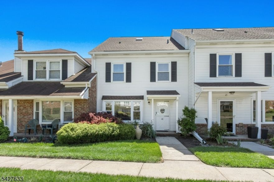 If you are looking for homeownership offering over 2,000 sq ft of living space across 3 levels w/in a gated community spanning over 60 acres, this is a standout opportunity. 44 Tisbury Ct is a 2 bed, 2.1 bathrm townhome in the highly sought after Southwyck Village in Scotch Plains. The home is freshly painted top to bottom & showcases Canadienne Mirage engineered hardwood flooring throughout the 1st & 2nd levels. The 1st fl includes a den w/ a wood burning fireplace, a kitchen w/ a large Sub Zero refrigerator, granite countertops & backsplash, & a newer dishwasher & microwave, along w/ a separate dining rm, living rm, & a powder rm. Upstairs, the primary suite features a skylight w/ integrated blinds installed in 2025, 2 closets including a custom designed walk-in closet, & an en suite bathrm w/ double sinks. The 2nd bedrm has 2 windows & 2 closets, located near a full hall bathrm & laundry rm. The 3rd fl loft, approx 21 x 19, is ideal for a home office, gym, or retreat, w/ a skylight & enormous storage closet. The patio offers space for grilling, seating, & plantings. The roof was replaced in 2025, & both the HVAC system & hot water heater are approx 2 yrs old. Ideally located near the pool & clubhouse w/ tennis & pickleball courts, gazebo, ample parking, & a 24/7 attended gatehouse. Pet friendly & just 1 block from the NYC bus, close to shopping, dining, parks, & major highways, w/ full day kindergarten & school bus service All this and only about 20 miles from Manhattan.