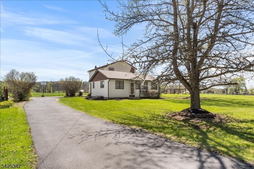 Whether you need room to grow or are looking to simplify this home offers a layout perfect for a range of lifestyles, from 1 floor living with a potential 1st floor bedroom option to work-from-home needs with a dedicated Home Office.  Conveniently located on the upper level are 3 bedrooms & a full bath.  Primary bedroom offers scenic views of the field behind the home & welcomes an abundance of natural light. Ground lvl: option for 1 floor living with a bonus room presently used as a bedroom plus a home office/study space in the Den & a 2nd full bath.  Main lvl: Kitchen with beautiful views a Dining Room for intimate gatherings & a stunning Great Room with a wood burning stove! It's a setup that works well for changing needs & modern living. The Great Room is open inviting & flooded with natural light, a space where you can spread out, unwind after a long day, host a night in, or watch the big game. The sliders lead out to the ground level deck extending this living space outdoors with ease. The private yard offers room to relax and enjoy the setting. From sunrise views across the field to evenings spent around a fire or quiet nights enjoying the natural surroundings, this outdoor space feels like an extension of the home itself. The basement offers room for storage and/or a workshop with Bilco doors providing  easy access to the huge side yard! Plant your roots and start your next chapter! Home Warranty included! New roof 2023!