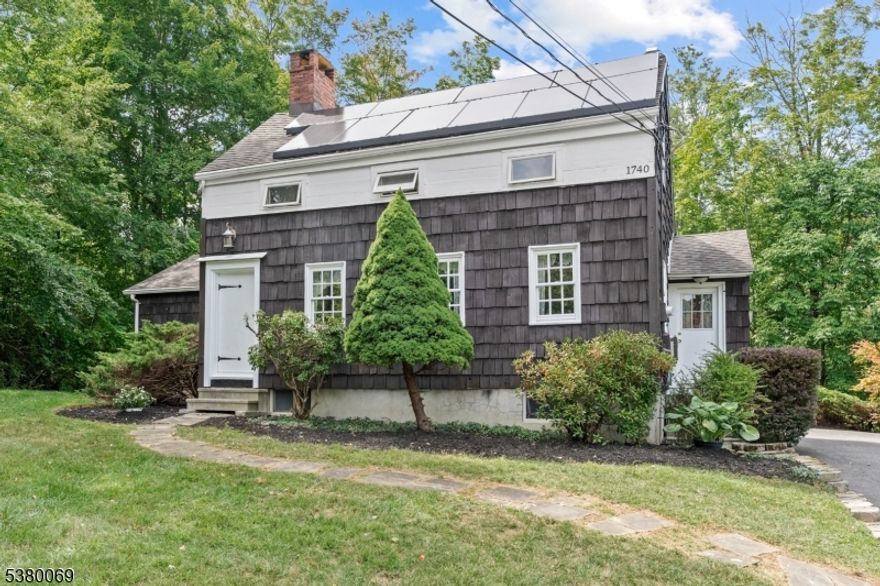 Historic home circa 1740 - one of Sparta's oldest homes. Thoughtfully relocated to its current site in the late 1990s. Despite modern updates and tasteful additions over the years . the home retains original character and timeless appeal. As you approach the home , you are greeted by its unique three eyebrow windows, a nod to 18th century craftsmanship. Original stone fireplace in the living room, and wide plank wood floor in the dining room. With four Bedrooms and two bathrooms, the layout is both functional and comfortable for modern living. Spacious family room with built-ins and sliding door that opens to a private rear deck perfect for outdoor entertaining or quiet moments in the serene backyard. This historic gem is conveniently located within easy reach of Main Street, schools, shopping, and commuter routes, allowing both a peaceful retreat and connected lifestyle. 3 Bedroom Septic.