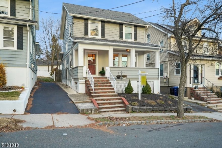 Welcome to this charming 3-bedroom, 2.5 bath Colonial nestled in Maplewood's hottest neighborhood. Updated and move-in ready! Enter via the welcoming front porch, perfect for relaxing with a coffee or a cocktail. The first floor features hardwood floors, great flow, and lots of light. Entry foyer leads to spacious living room which flows to the formal dining room. Eat-in-kitchen offers quartz counters, newer stainless steel appliances, and large breakfast bar. Flexible office / mud room space off of dining room offers more space for organization, relaxation, or work. From there, walk out to the private, fenced-in backyard -- the perfect spot to relax, play, and dine. A powder room completes the first floor. Upstairs, there are three good-sized bedrooms and a large, updated full bath. Walk up to the third floor, currently used as an oversized storage area but brimming with potential for finishing. Just bring your imagination! Downstairs, the finished basement offers high ceilings and includes a large recreation room, laundry area, updated full bath, and storage. Additional features include detached 1-car garage and central air / heat. Close to all that Lightning Brook, Hilton, and Springfield Avenue have to offer including shopping, restaurants, parks, Hilton Library, and the fabulous Maplewood Porchfest. Easy access to major highways as well as the jitney to NYC trains. Don't miss it!