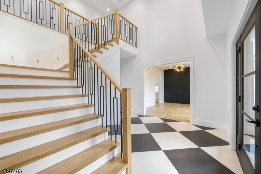 Welcome to 48 Grant Ave, located in the sought-after town of East Hanover. This exceptional new-construction home offers 4000 sq ft of brand-new luxury living space. Designed with elegance and comfort, the home features 4 bedrooms and 5.5 bathrooms, all finished with upscale materials and attention to detail. The 1st floor showcases a spacious gourmet kitchen with high-end stainless steel appliances, quartz countertops, an oversized center island, and abundant custom cabinetry. This beautiful space opens seamlessly to the dining and living areas, creating an ideal setting for both everyday living and sophisticated entertaining. A private office, stylish powder room, and a mud room complete the first floor.The second level includes four generously sized ensuite bedrooms, each offering its own full private bathroom. The primary suite serves as a luxurious retreat, featuring two walk-in closets and a spa-like bathroom with dual sinks, a large stand-up shower, soaking tub, heated floors, and elegant marble walls. The fully finished basement provides high ceilings, a full bathroom, and flexible open space perfect for a recreation room, gym, or guest accommodations .Behind the wall in the basement leads to a theater room. The exterior includes a 2-car garage and a large driveway providing ample parking for multiple vehicles. The fenced-in backyard features a beautiful combination of pavers and grass, offering the perfect outdoor environment for entertaining, play, or relaxation.