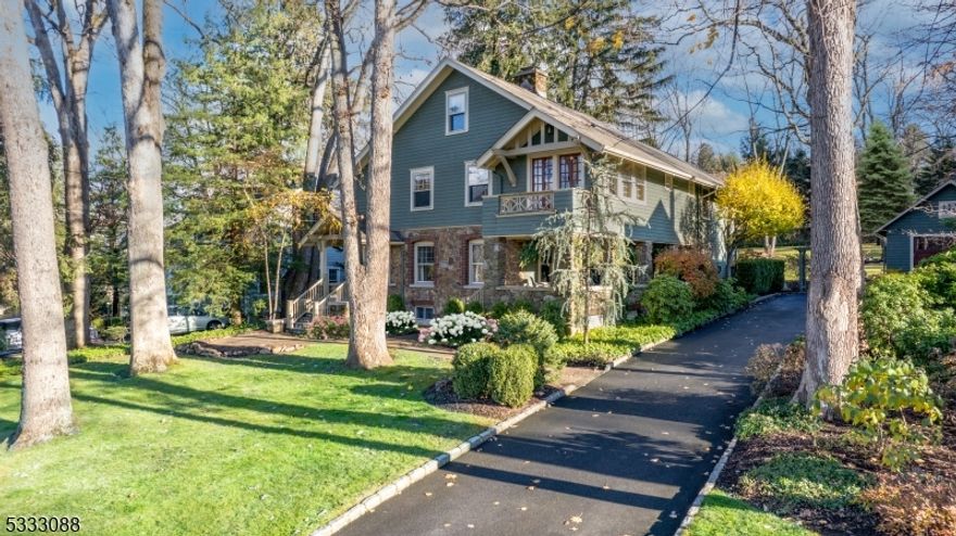 One of Washington Ave's most coveted properties, this fully updated 6 bed, 4FB/1HB gem is not going to last long! This iconic location is a short walk to schools & train. Homeowners have left no stone unturned in this custom craftsman stunner. The best of classical workmanship & modern enjoyment. Foyer opens to inviting LR w/ gorgeous stone FP & access to kitchen, DR & covered porch. Kitchen features center island, SS appls, additional wall oven, warming drawer, & paneled refrigerator. Separate work station w/ desk. Butler's pantry w/ bev fridge. Breakfast area is flanked by windows overlooking vast backyard. Nearby mudrm w/ storage & window bench. Huge sunken family room w/ spectacular millwork, fieldstone gas FP & french doors leading to side & back patios. Lovely DR w/ double windows overlooking glorious covered porch. 2nd floor features luxurious primary suite w/ his/her walk-in closets, spa like marble bath w/ steam shower, heated fl & private water closet. 3 additional bedrooms w/ updated hall bath & two walk-in linen closets. Enjoy doing laundry in oversized laundry room w/ heated fl. Thoughtfully designed 3rd level offers 2 bedrooms w/ hidden storage & updated bath. The piece de resistance is the basement featuring 2 large rec rooms, one w/ full bar. Wine room, full bath, 2nd laundry, exercise rm & multiple utility rooms. Park-like exterior space w/ mature landscaping & exterior lighting. Large back patio w/ brick and stone inlay offer perfect indoor/outdoor living.