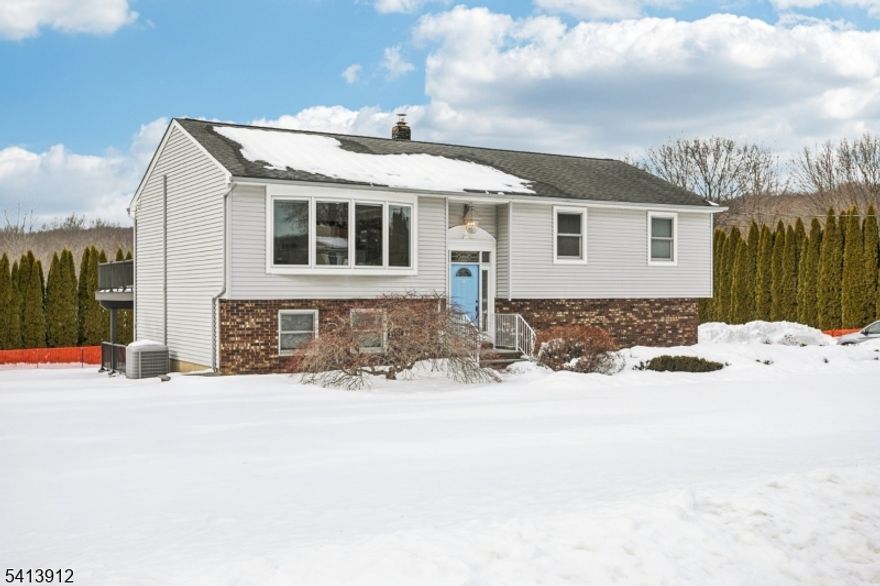 Welcome to this beautifully maintained 3-bedroom, 2-bath bi-level in the desirable High Breeze section, just minutes from Route 23. The upper level offers an open-concept layout with a center island plus a movable island, oversized windows that fill the home with natural light, and French doors leading to a Trex deck and patio overlooking professionally landscaped, park-like property ideal for indoor/outdoor entertaining. Three spacious bedrooms feature double closets and excellent storage. The ground level includes a large family room with French doors to a second patio, a full bath, laundry room, abundant storage, and an oversized two-car garage. Additional highlights include a generator hook-up, newly paved oversized driveway, and new top-of-the-line central air. A wonderful combination of comfort, space, and location. Highest and Best 3/5 @ 12pm.