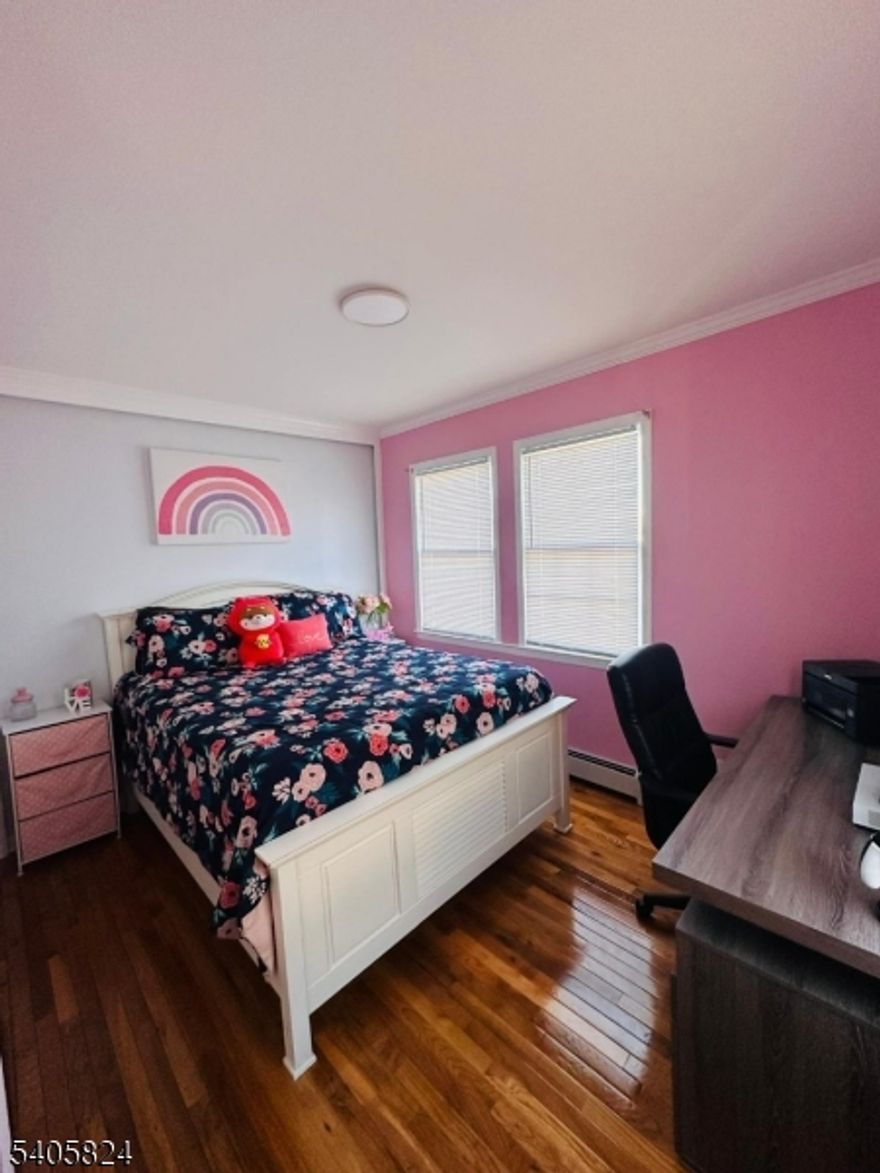 Welcome home to this well-located 2-bedroom apartment, ideal for commuters and those seeking convenience. Located just steps from an NYC bus stop with easy access to major highways, and close to shopping, dining, and everyday essentials. Apartment features include two bedrooms, a bright and functional living space, all utilities included (tenant responsible for internet only), shared on-site laundry, and one driveway parking space included.
