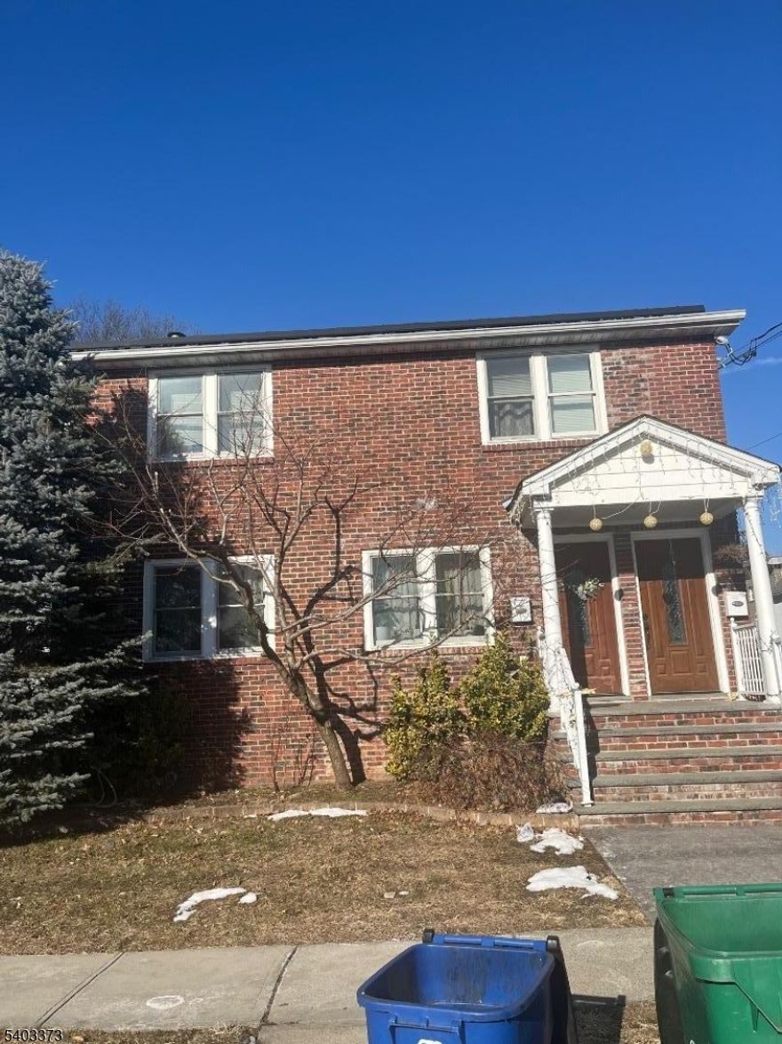 Second floor 3 bedrooms 2 full bathrooms apartment.  enjoy an open floor plan hardwood throughout  and update bathroom and kitchens