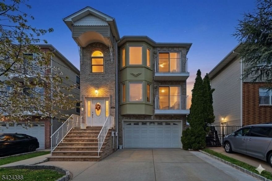 Stunning newer construction in the highly desirable Elmora section an exceptional opportunity to own this expansive income-producing two-family home. Situated on a 35x102 lot, the property offers 6 bedrooms and 5 full bathrooms, plus a fully finished walkout ground level for added versatility. Each of the first and second floors features a well-designed layout with 3 spacious bedrooms, 2 full bathrooms including a primary suite with a private bath and a dedicated laundry room, providing both comfort and convenience for occupants or tenants. Both units BOAst an open-concept design with generous living and dining areas. Bright living rooms on each level lead directly to private balconies, creating a seamless indoor-outdoor flow ideal for everyday living and entertaining. The finished ground level offers additional living space with a full bathroom, recreation, or flexible use.Additional highlights include hardwood flooring throughout, central heating and cooling, and modern kitchens equipped with stainless steel appliances and dishwashers. The exterior features an oversized attached garage and a wide driveway, offering ample parking. Ideally located near NYC transportation and within walking distance to schools, shopping, and dining, this property is ideal for both investors and Owner-occupants seeking strong rental potential and long-term value. Low Taxes!