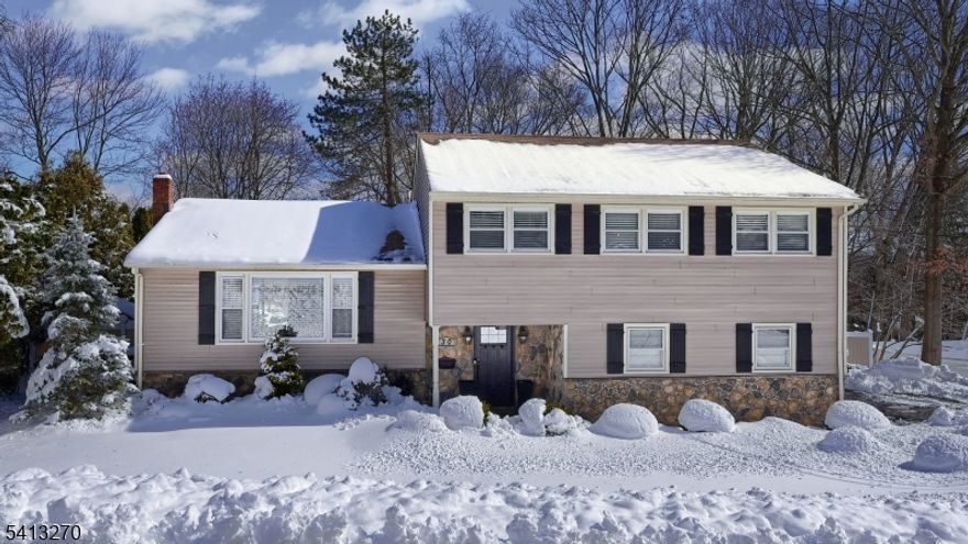 FINAL AND BEST to be submitted on Wednesday at 1PM on 3/4/26. Stunning Colonial Split blending timeless elegance with modern design throughout. This 4-bedroom, 2.1-bath home offers an open-concept layout and sun-filled interior on over a half-acre of beautifully landscaped property. The ground level welcomes you with a spacious foyer leading to a generous family room with sliders to the patio-beautifully designed backyard retreat with multiple outdoor living areas, including a firepit, a pergola-covered sitting area, and a fenced yard. Enjoy summer at its best with an above ground pool surrounded by Trex decking. This level also includes a powder room, laundry room, and access to the 2-car garage. The show-stopping main floor features a white custom gourmet kitchen with quartz countertops, center island for casual dining, and stainless-steel appliances. A separate dining area with sliders to the deck flows seamlessly to the backyard and pool. The living room is anchored by a beautiful stone gas fireplace. Upstairs, the primary suite offers a sleek, modern bath, while three additional bedrooms share a stylish main bath. Add'l features include, hardwood floors, recessed lighting and high-end elements throughout plus a newer high-efficiency boiler. Ideally located on a picturesque, tree-lined street near top-rated Fallon Elementary School, NYC transit, shopping, and major highways. Move-in ready and built for both entertaining and everyday living.