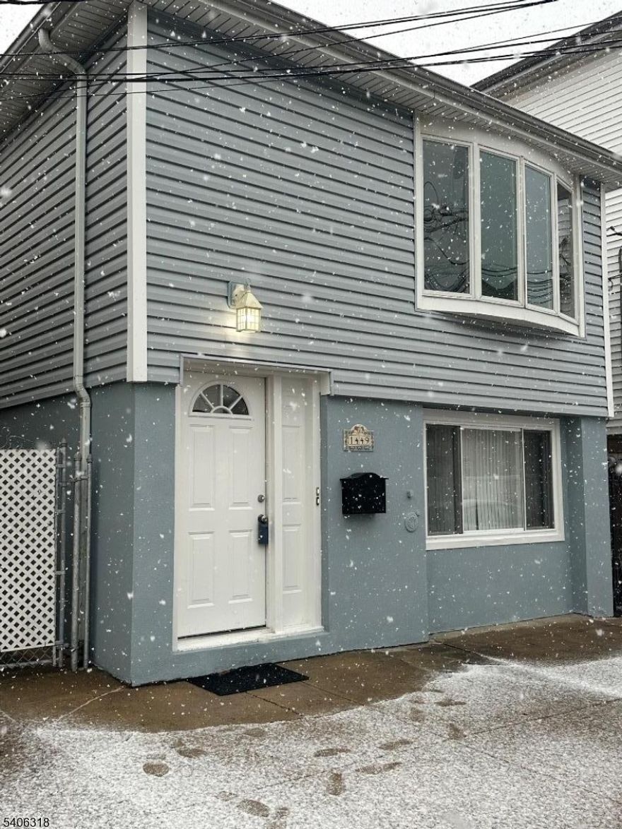 Don't miss this beautiful, completely renovated 3 bedroom plus bonus room/office, 2 full/1 half bath home. Stainless steel appliances, in-wall air conditioners and washer/dryer all brand new.  White quartz kitchen countertops   Hardwood floors on 2nd level. Bright, sunny and spacious eat-in kitchen with sliders to paver fenced-in yard. This move-in ready home is ideally located close to schools, transportation and shopping.