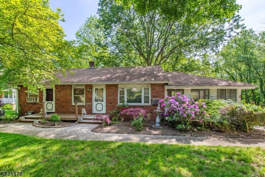 Single family raised ranch ideally located on this beautiful outdoor oasis. Natural gas, public water and sewer. LOTS of parking with two driveways for 10 parking spots! Storage abounds with full length basement, attic and large outside shed. Basement includes workshop, laundry, newer furnace (multi zone) and ground level walk out. Near public transportation, highways, groceries, shopping and under 1 hour from NYC!