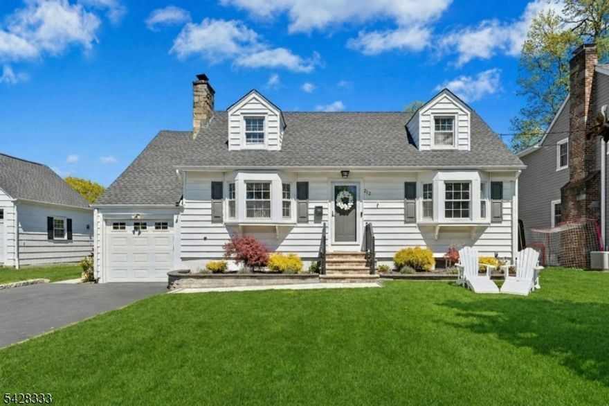 Gorgeous Colonial in Cranford's sought-after Heathermeade section just a block to Brookside School! This home is truly larger than it looks - over 2500 sq ft of finished living space - featuring a stunning 2-story rear addition and expansive living space throughout. The sun-filled first floor offers a spacious living room with wood-burning fireplace, seamlessly flowing into a show-stopping kitchen and open family room perfect for entertaining and everyday living. A versatile den/office, beautiful full bath and first-floor bedroom with walk-in closet add flexibility. Upstairs, you'll find three oversized bedrooms with generous closets, a beautifully renovated full bath with custom tile and tub/shower, plus a bonus sitting room and two additional walk-in closets. The finished basement is a standout, featuring a custom bar, leisure area, and rec room ideal for hosting or relaxing. Step outside to a large backyard complete with a newly paved patio, seating area, and outdoor bar with granite counters your private entertaining oasis! Incredible location just steps to Brookside School, Dryers Farm, Parks, Cranford's vibrant downtown, and the train station. Spacious, stylish, and move-in ready this one will impress even the most discerning buyer! Must see!