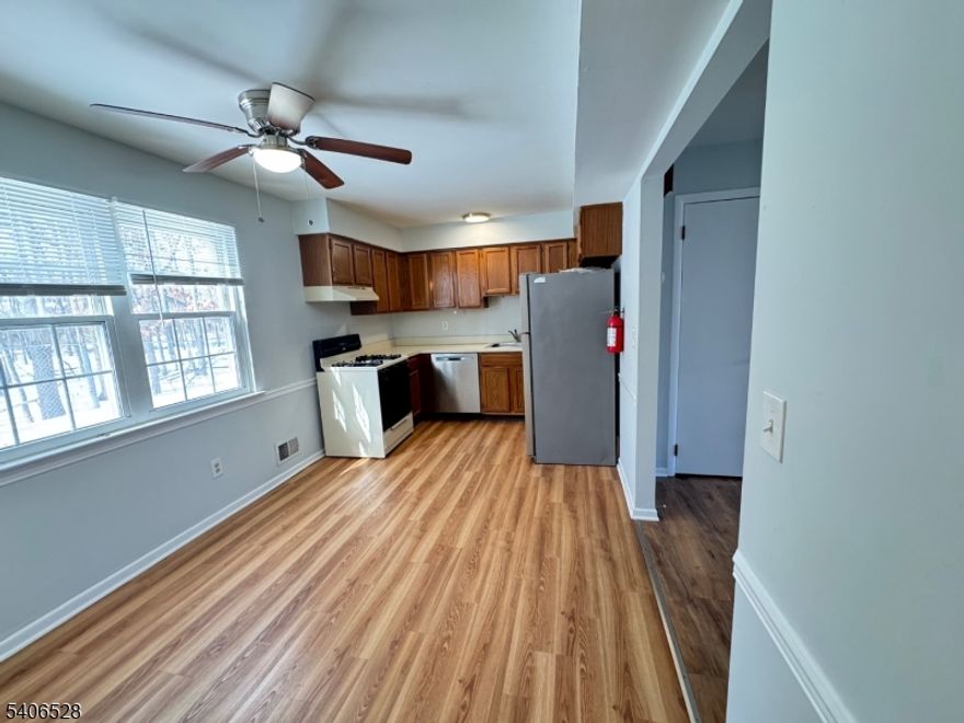 Impeccably maintained, light-filled two-bedroom corner unit with a prime location close to shopping and the train.