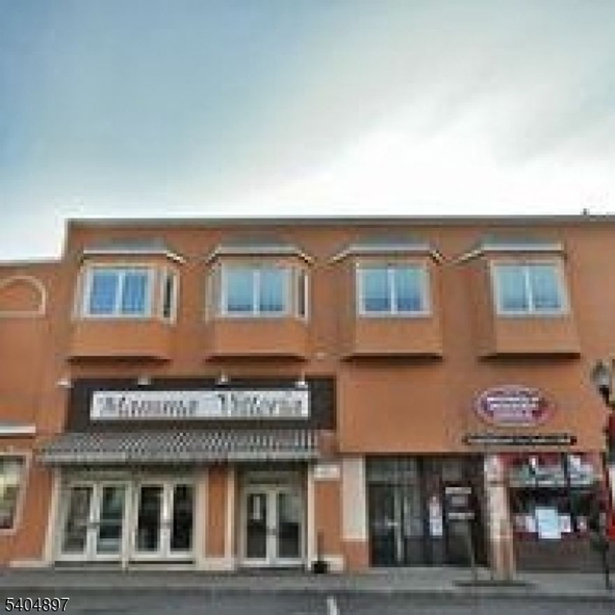 Located in the heart of downtown. Perfect blend of convenience and comfort.  Move in ready. New dishwasher, microwave and refrigerator.   Washer dryer in unit.   Hardwood floors throughout, with an abundance of natural light by over size windows. Wonderful open floor plan with 9 ft ceilings,  oversize bath with skylight, generous kitchen cabinetry granite countertops, oversize bedroom.  Steps from NYC bus, gym, shopping, and Eateries. Well maintained building w/ elevator.     Extra storage in caged area in basement of building.