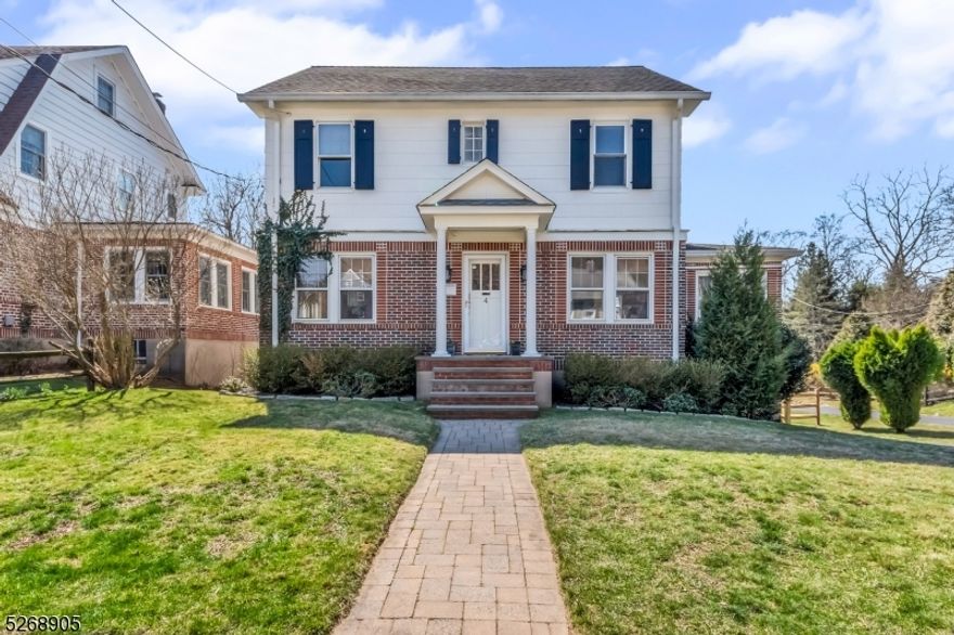 Inviting updated colonial with hardwood floors and sun-filled rooms!  Kitchen features granite and stainless steel countertops, stainless appliances and farm sink and open to spacious dining room. Living room has hardwood flooring with chestnut inlay, recessed lighting, gas fireplace and cozy reading nook.  First floor also offers sunroom, full bath and access to wood deck with pergola for shaded summer afternoons.  Second floor includes primary bedroom with outfitted closet, 2 additional bedrooms plus office and fully renovated full bath.  Attic has finished room and basement is unfinished with workshop and laundry and exercise room.  Other highlights include upgraded electrical with generator set-up, newer boiler, central air and water heater, refinished wood floors, fenced yard, and storage under deck. Minutes to the Morristown Green with eclectic dining options and entertainment venues, very close to Whole Foods, high school and elementary school, easy access to all major arteries.