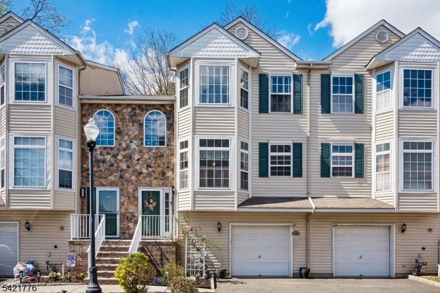 More pictures to come.  Don't miss this opportunity to own this beautifully maintained townhouse offering the perfect blend of space, comfort, and unbeatable convenience in the heart of Rahway with low monthly maintenance.  Ideally located within 10 minutes' walking distance to the NJT train with direct service to Midtown Manhattan, this home is a commuter's dream. Featuring 3 spacious bedrooms and 3.5 baths, this home offers a versatile layout designed for modern living. The main level showcases a bright living room and dining area with hardwood floors, a cozy gas fireplace that is perfect for entertaining or relaxing evenings. The eat-in kitchen includes stainless steel appliances, a pantry closet, and an easy flow for everyday functionality.   An updated powder room completes the first level.  On the second floor, you'll find three well-proportioned bedrooms, including a primary suite with a full bath, a hallway bath, and the added convenience of a second-floor laundry. One bedroom is currently being used as a home office, ideal for today's lifestyle. The walkout basement provides additional living space and serves perfectly as a family room, complete with a full bath and garage access.  Sliders lead to a private backyard patio, offering a great space for outdoor enjoyment.  Located near Rahway's vibrant downtown, you'll enjoy proximity to top-rated restaurants, shopping, parks, recreation, and houses of worship.