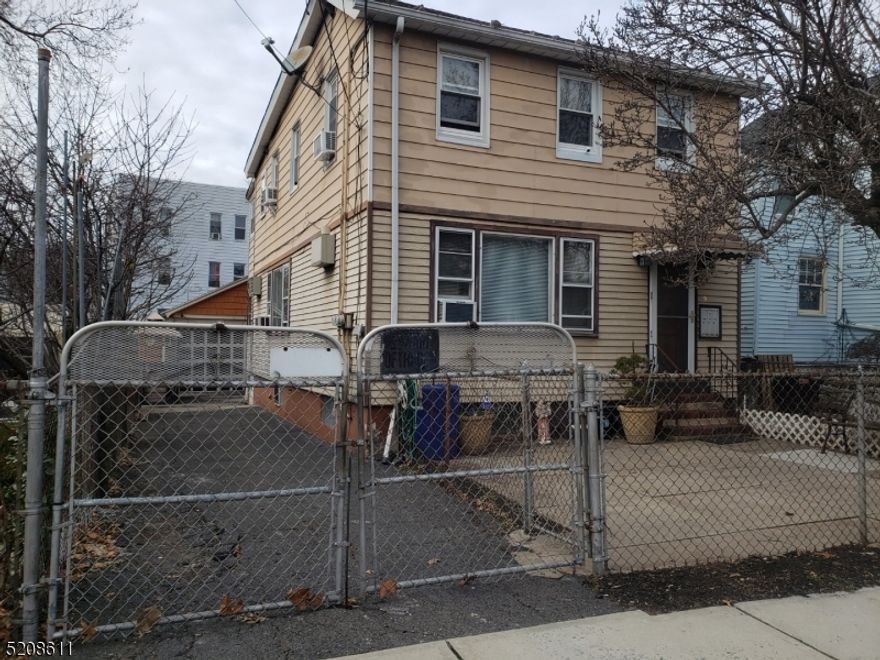 BOM--Great opportunity to purchase this two family house in the nice, residential neighborhood of Belleville.  First floor consists of living area, two bedrooms and full bath, kitchen is in the basement and another living area and full bath, 2nd floor is renovated with three nice size bedrooms, eat in kitchen and living room, tastefully decorated and receiving $1,500 rent, month-to-month.  Parking for 8 cars, garage and office. Both lots 17 & 18 have been merged for easy purchase.  Lot 17 is 30X85 and Lot 18 is  30X89.99.*  Price for both lots is $475,000, taxes are low combined.