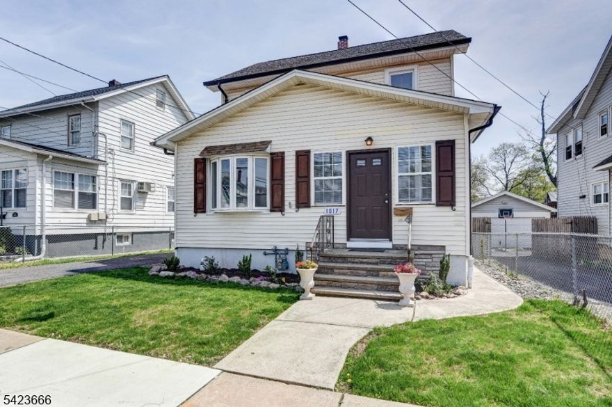 LOCATION, LOCATION, LOCATION!! Welcome to 1017 Grandview Ave   a beautifully updated and move-in ready home perfectly situated in the heart of Union! This spacious 4-bedroom, 2 full bath residence offers a flexible and functional layout ideal for today's lifestyle. Location is everything, and this home delivers just 1-block from local shopping including Stop & Shop, and close to all that Union has to offer including easy access (just steps) to NYC-bound buses. Train station at Kean University is just two miles away. The main level features a bright and inviting living room, a formal dining room perfect for entertaining, and a dedicated front office with elegant French doors ideal for working from home. A convenient first-floor bedroom and full bath provide excellent options for guests. Upstairs, you'll find three generously sized bedrooms and a second full bath, offering ample space and comfort. The fully finished basement with new French drain adds even more living space, perfect for a recreation room, home gym, or media area. Outside, enjoy the benefits of a detached one-car garage and a long driveway that accommodates up to four additional vehicles. Don't miss this incredible opportunity to own a turnkey home in one of Union's most convenient and desirable locations!