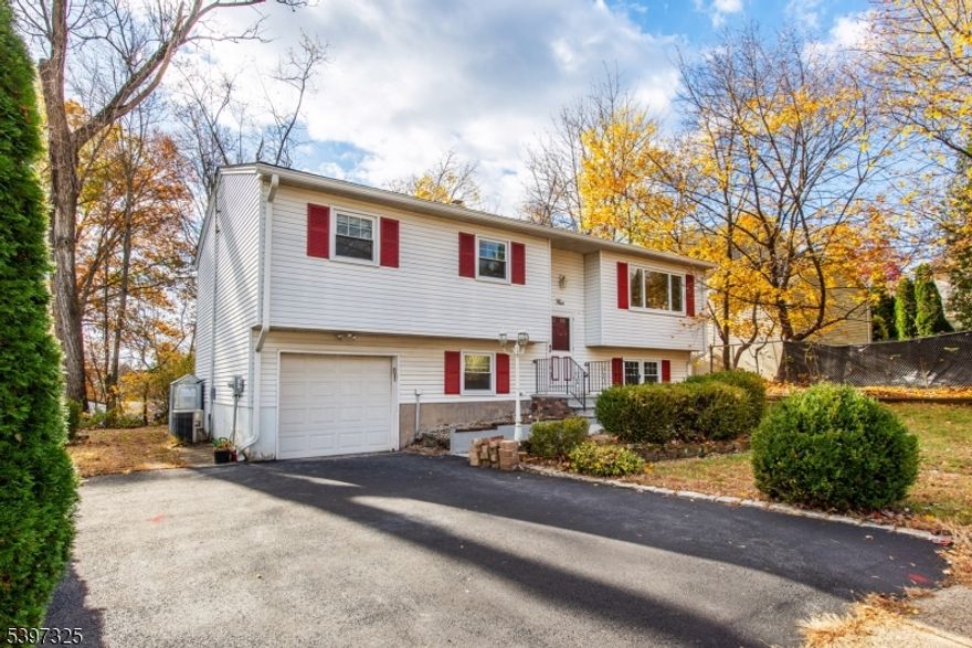 Welcome to this beautifully updated 4-bedroom, 2-bath bi-level home located on a quiet Cul de sac street in the Lake Hiawatha section of Parsippany. This spacious rental offers bright, open living with an updated kitchen, hardwood floors, and generous natural light throughout. The main level features a comfortable living room, dining area, kitchen, three bedrooms, and a refreshed full bath. The ground level provides even more living space with a large family room, fourth bedroom or guest suite, second newly updated full bath, and convenient walk-out access to the backyard?perfect for extended living, work-from-home needs, or hosting guests. Additional highlights include central air, laundry, attached garage, and a level yard. Moments from shops, schools, restaurants, parks, and NYC transportation, this home offers exceptional convenience in the Lake Hiawatha community. Pets okay. Available immediately.
