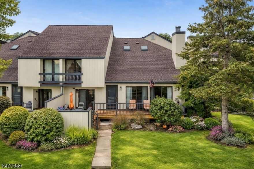 WELCOME TO THIS BEAUTIFULLY UPDATED 2 BED, 2.5 BATH MULTI-LEVEL TOWNHOUSE FEATURING A LIGHT-FILLED OPEN CONCEPT LAYOUT IN THE CEDARS, ONE OF BASKING RIDGE'S MOST SOUGHT-AFTER COMMUNITIES. THE HEART OF THE HOME IS THE EXPANSIVE LIVING ROOM, WHERE SOARING VAULTED CEILINGS AND A DRAMATIC WALL OF WINDOWS CREATE AN AIRY, OPEN ATMOSPHERE. A COZY WOOD-BURNING FIREPLACE SERVES AS THE FOCAL POINT, WHILE SLIDING GLASS DOORS LEAD TO A PRIVATE, SPACIOUS DECK. NOTABLY, THIS OUTDOOR RETREAT FEATURES A RARE NATURAL GAS LINE THAT HOOKS DIRECTLY INTO YOUR GRILL. THE SEAMLESS FLOW CONTINUES INTO THE FORMAL DINING ROOM. THE KITCHEN HAS BEEN TASTEFULLY UPDATED WITH A FULL SUITE OF PREMIUM STAINLESS STEEL APPLIANCES AND FEATURES AMPLE CABINETRY, A LARGE PANTRY, A SPACIOUS EAT-IN AREA, AND ACCESS TO THE UNIT'S ATTACHED GARAGE. THE SECOND LEVEL IS DESIGNED WITH PRIVACY IN MIND; BOTH BEDROOMS FEATURE GENEROUS CLOSETS AND PRIVATE BATHROOMS. THE PRIMARY SUITE'S BATHROOM HAS BEEN COMPLETELY RENOVATED AND FEATURES A HIGH-END SHOWER. A STANDOUT FEATURE IS THE VERSATILE BONUS LOFT, ILLUMINATED BY SKYLIGHTS AND OPEN TO THE LIVING ROOM BELOW. A BEAUTIFULLY FINISHED BASEMENT EXPANDS THE LIVING SPACE, PROVIDING THE PERFECT OPPORTUNITY FOR A HOME OFFICE OR RECREATION. RESIDENTS ENJOY PREMIUM COMMUNITY AMENITIES, INCLUDING A POOL, TENNIS COURTS, PLAYGROUND, AND CLUBHOUSE. SITUATED IN THE PRESTIGIOUS BERNARDS TOWNSHIP SCHOOL DISTRICT, THIS HOME IS A COMMUTER'S DREAM, LOCATED JUST MINUTES FROM RT-78 AND RT-287.