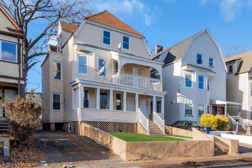 Welcome to this oversized two-family home located at 537 N Grove Street, East Orange fully vacant and move-in ready, offering exceptional space, flexibility, and long-term value.This impressive property features 9 total bedrooms and 3 full bathrooms, ideal for owner-occupants seeking additional income or investors looking to maximize rental potential.Unit 1 offers 3 bedrooms and 1 full bathroom, featuring modern white kitchen cabinetry, stainless steel appliances, a newly tiled bathroom, and a charming front porch.Unit 2 is a spacious duplex spanning the 2nd and 3rd floors, offering 6 bedrooms and 2 full bathrooms. Highlights include stainless steel appliances, an additional bonus room ideal for a home office or playroom, a separate entrance to the 3rd floor, and its own front porch.Throughout the home, rooms are generously sized and filled with abundant natural light. The property also includes a large semi-finished basement, providing valuable additional usable space.Additional features include a private driveway with parking for up to five vehicles and a backyard perfect for outdoor enjoyment.Conveniently located near major highways, public transportation, shopping, and with easy access to NYC, this property presents a strong long-term opportunity.