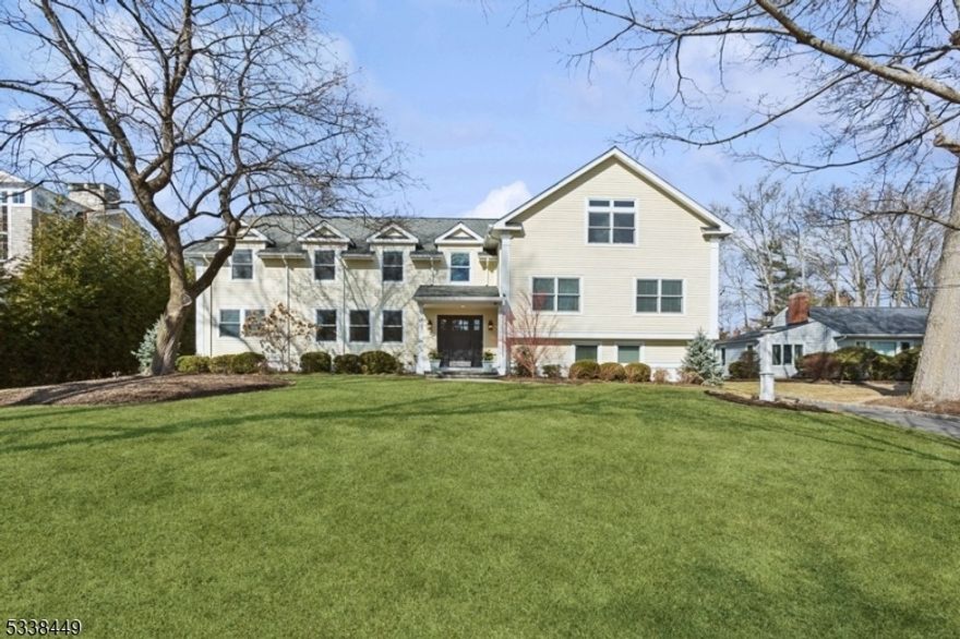 Nestled in the highly sought-after Rolling Hill neighborhood of Chatham Township, this custom home sits on a picturesque 0.63-acre lot with 5 BRs, 4.5 BAs and has an expansive layout. The heart of the home is the spectacular light filled family room, featuring a soaring vaulted ceiling with seamless access to the chef's kitchen. The kitchen boasts exquisite cabinetry, high-end SS appliances, walk-in pantry and a charming breakfast area. French doors in the family room open directly to the fenced in backyard. The second floor features 3 generously sized BRs and 2 full BAs. A few steps up, the expansive primary suite is complete with two walk-in closets and a luxurious en-suite bath. Just a few steps higher, an add'l flex space can be used as a 5th bedroom, a private office, a recreation room, or a wellness retreat. This level also includes a private en-suite bath, making it an ideal space for guests or a secluded getaway. The lower level offers a room ideal for a home office, playroom, or creative space. A spacious basement with abundant storage and a dedicated gym area. This exceptional home is located just 2 miles from the Chatham train station, offering an easy commute to NYC. Enjoy close proximity to top-rated Chatham schools, charming downtown shops and restaurants. This is a rare opportunity to own a beautifully expanded home, with attractive property taxes of approx. $23K/Yr, in one of Chatham's most desirable neighborhoods.