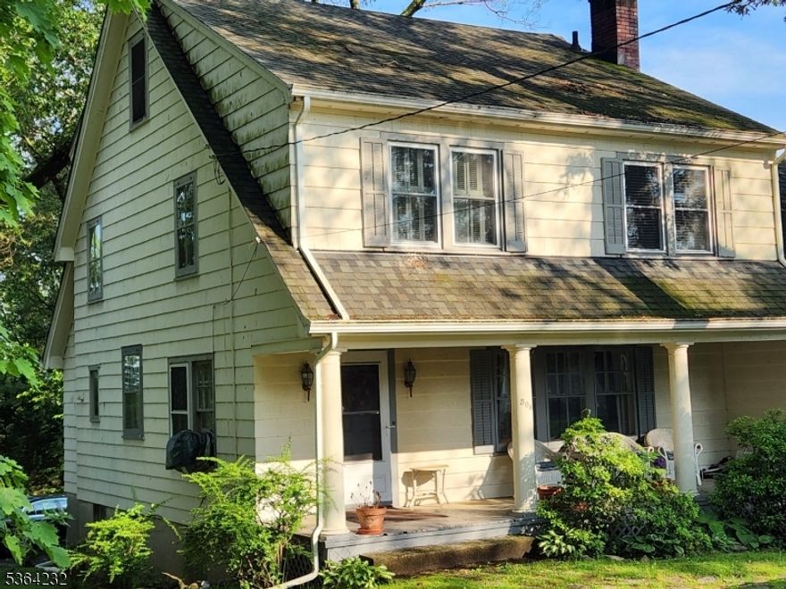 Old world charm abounds. Beautiful 4 bedroom Colonial with reservoir views.