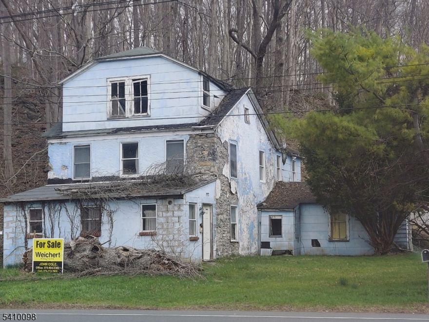 390 feet of highway frontage great for any business use, the building used to be a stagecoach stop then was a restaurant then a 2-family home it has a lot of historical value and is a solid 2 feet thick rock walls, 2 fireplaces, lots of potentialpresent all offers