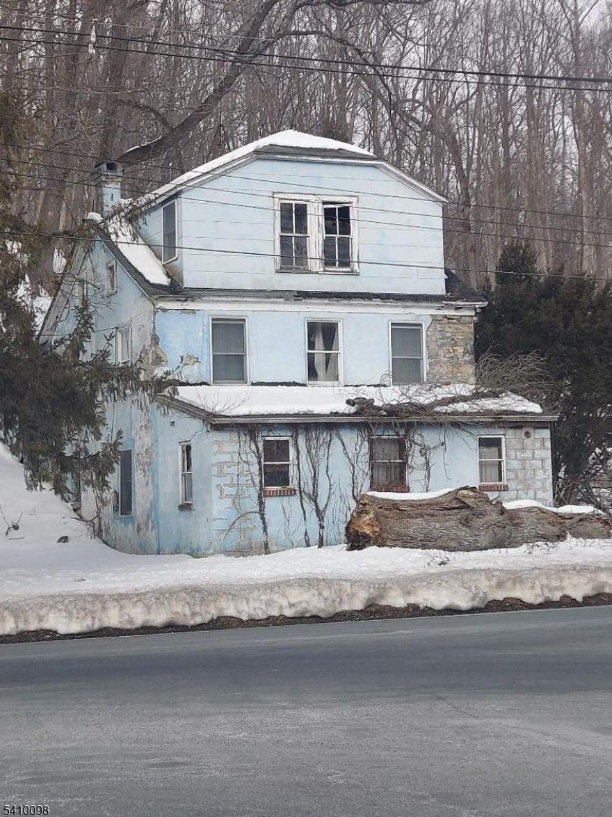 390 feet of highway frontage great for any business use, the building used to be a stagecoach stop then was a restaurant then a 2-family home it has a lot of historical value and is a solid 2 feet thick rock walls, 2 fireplaces, lots of potentialpresent all offers