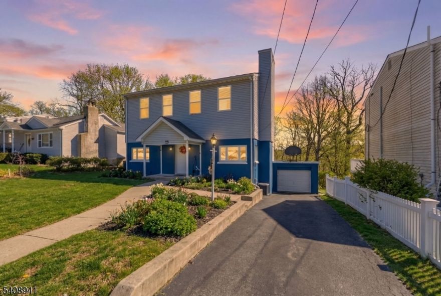 Spacious and move-in ready 3 bedroom, 2 full bathroom single-family home offering comfort, flexibility, and a desirable lake-area setting in Hopatcong, with almost 2,000 square feet of living space. The main level welcomes you with a large living and dining room combo that flows into a generous kitchen with direct access to a large deck featuring views of Lake Hopatcong, ideal for entertaining or relaxing. Just off the kitchen is a versatile den or home office, along with a convenient laundry area and a full bathroom.The second level features three bedrooms, including a massive primary bedroom complete with an en-suite bath, walk-in closet, and private deck. Original hardwood floors, fresh paint, and updated lighting throughout enhance the home's move-in ready appeal. Additional highlights include a one-car garage and an unfinished basement offering ample storage space.Conveniently located just minutes from Crescent Cove Beach and nearby lake amenities, this home also offers easy access to major highways, including Route 80. The nearby Lake Hopatcong NJ Transit station provides rail service toward Newark and Hoboken with connecting routes into NYC. A great opportunity to enjoy lake-area living with space, convenience, and lifestyle appeal.