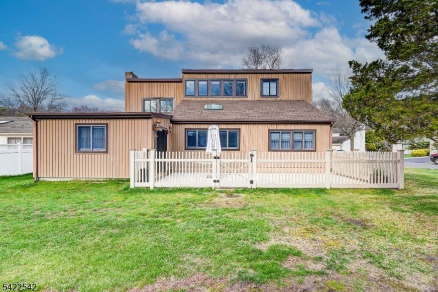 A rare opportunity to own this beautifully maintained 4-bedroom Colonial in a highly desirable community! Situated on a premium corner lot in a quiet cul-de-sac, this home offers a convenient first-floor bedroom and full bath- perfect for guests. Enjoy 1.5 additional baths, a spacious living room, dining room, next to the formal large family room ideal for entertaining. The updated kitchen features quartz countertops, stylish backslash, center island, and newer appliances. Step outside to a newer patio overlooking the yard, plus an oversized 2-car garage with attic loft for storage and an extended driveway for ample parking. Major updates include roof- 2022, patio- 2022, water heater- 2018, some windows. Additional highlights include skylight, recessed lighting, and moldings throughout. Community amenities include pool, tennis, basketball courts, playground, and clubhouse. Conveniently located near transportation, shopping, dining, and more.