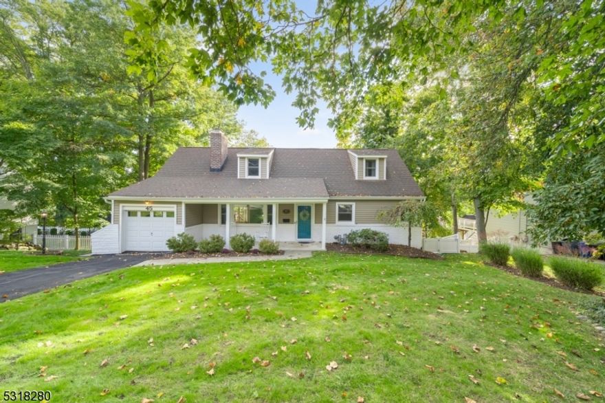 Exceptional expanded Cape with rocking chair front porch located in the extremely desirable Washington's Headquarters neighborhood. This four bedroom, two full bath home with a large finished basement leaves nothing to be desired. The main floor offers an open and inviting floor plan. A large living room with oversized fireplace welcomes guests to the home. The open dining room and kitchen is ideal for entertaining with peninsula for additional seating and slider to the large deck. A one-car garage connects conveniently off the dining area. There is an updated full bathroom as well as two bedrooms on the level. Upstairs is another bedroom, full bath room and large primary. The primary offers several closets including a walk-in and tasteful exposed brick. The finished lower level was recently renovated and has another fireplace with wood burning stove, bonus room, laundry and unfinished storage space. The lower level has tons of natural light and a walkout to a large paver patio. Outside the deck overlooks the large, fully fenced yard, ideal for pets. There's a newer shed as well for additional storage. Close to Downtown, spectacular dining establishments, train, shopping, Mayo Performing Arts Center, and so much more 45 Washington Ave should not be missed.