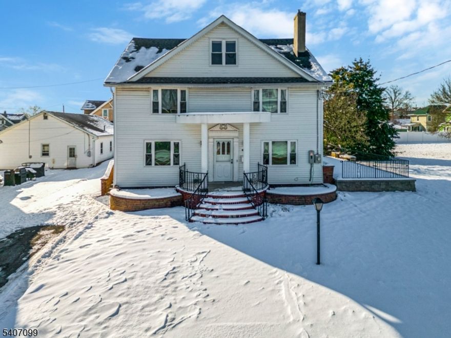 Opportunity is knocking with this Stunning 5-Bedroom, 3 Level Home with Income Potential " Also Available with Adjacent Buildable Lot. This beautifully updated home offers approximately 2,800 square feet of versatile, sun-filled space designed for comfort, functionality, & long-term value. Featuring 5 bedrooms & 4 full baths, the layout is ideal for immediate occupancy or use as a strong income-producing rental. At the heart of the home is an expansive great room with grand fireplace, perfect for entertaining or everyday relaxation. The formal dining room opens to the side patio allowing the interior to mesh with the outside. The chef's delight renovated kitchen showcases stainless steel appliances, an oversized island, & ample cabinetry, seamlessly flowing into a bonus sunroom with gorgeous views of the private, fenced-in yard an ideal retreat for morning coffee or unwinding at the end of the day. Additional highlights include a long private driveway, generous outdoor space, & a detached shed offering charming creative studio vibes. Added Value Opportunity: The adjacent vacant lot MLS 400649 is also available for purchase, presenting a rare dual-strategy investment build new while generating income from the existing home. Together, the parcels create an expansive approximately 150' x 165' footprint, ideal for developers, investors, or savvy buyers looking to maximize return and future potential in a single acquisition.