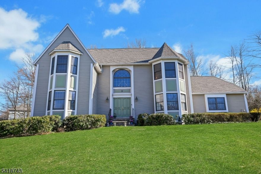 Move right into this warm and welcoming home featuring an open floor plan, spacious rooms, and freshly painted interiors that create a bright, airy feel throughout. Gleaming hardwood floors add timeless character, while the finished lower level offers flexible space for a family room, home office, or guest retreat. Step outside to enjoy relaxing mornings on the screened-in porch or entertain on the deck overlooking the generous property. Perched high on a lovely lot in a neighborhood setting and conveniently close to town, shopping, and commuter routes, with gas available in the street for future connection. A wonderful opportunity to enjoy comfort, space, and easy living in a desirable location...Welcome Home