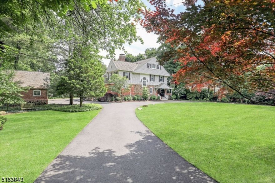 Ideally nestled on 0.68 prime acres in the heart of Old Short Hills, this completely renovated home is absolutely stunning offering a classic alternative to new construction.