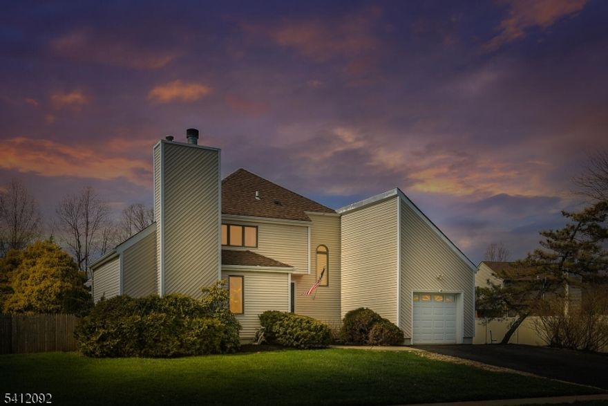 You'll love the nearly 1,900 square feet of living space in this freshly painted, spacious, and charming 3-bedroom, 2.5-bath home with a 1-car garage featuring MyQ app remote access. The backyard is perfect for entertaining or relaxing, offering a deck with pergola, a fenced yard, shed, and above-ground pool. Inside, a tiled foyer welcomes you, flanked by a vaulted-ceiling living room with a Heatilator fireplace and a dining room with hardwood floors with a Pella slider with inset blinds. The kitchen flows seamlessly into the family room with a second Pella slider and a bay window that fills the space with natural light and provides a lovely backyard view. Upstairs, all bedrooms feature carpeting, ample closet space, and ceiling fans with lights. The primary features an ensuite bath, and the main hall bathroom was tastefully updated in 2023. If you're seeking a clean, well-maintained home with plenty of space and the opportunity to add your personal touch, this one is not to be missed.