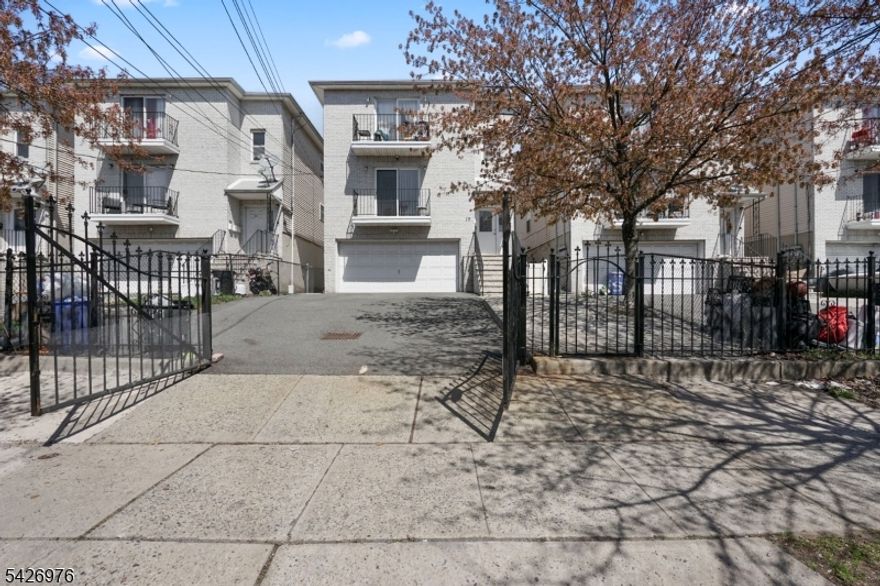 Well-maintained 3-family property located in Newark's North Broadway section. Built in 2001, this spacious multi-family offers approximately 5,000+ sq ft of living space, making it ideal for both investors and owner-occupants.Each unit features 3 bedrooms, with Unit 1 offering 1 full bathroom, and Units 2 and 3 each offering 2 full bathrooms. Functional layouts with generously sized rooms provide comfortable living and strong rental potential.Property includes a 2-car garage and additional off-street parking.Conveniently situated near major highways, public transportation, schools, and shopping. Excellent opportunity to generate steady income or live in one unit while renting the others.