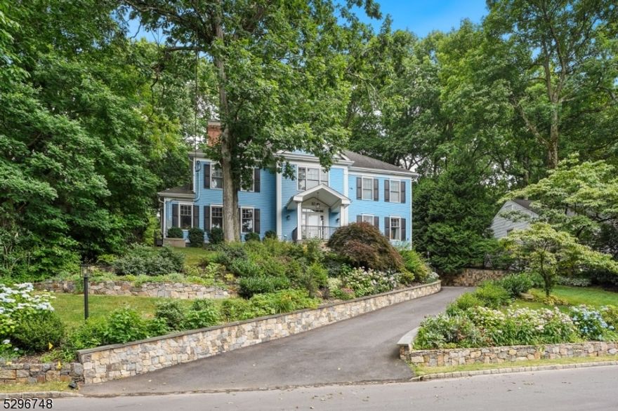 Sophisticated CHC with an unique blend of quality, space, convenience in a premier location! Built by renowned builder Dickson Peer, this unrivaled residence, has every amenity for the discerning consumer! Spacious sun drenched rooms, gleaming wood floors, stylish kitchen & updated baths. 1st level has a large LR, oversized elegant DR, office & powder room. Well-appointed (Sub Zero Frig & freezer column, Miele speed oven, 2 dishwashers), gourmet kitchen & breakfast rm open into the inviting FR. Sliders open onto the incredibly private bluestone patio & serene park-like property ideal for entertaining. 2nd level has 5 large BRs & 3 newer baths. Stunning primary suite has a luxurious, newly appointed primary bath, WIC & dressing area. Wonderful play room on 3rd level is accessed by pull down staircase & is perfect for winter - electric baseboard heat. Lower level offers a large recreation area, flexible space for use as another office or gym & an oversized 2 car garage. Extraordinary residence, perfect for entertaining, offers unbeatable value & is an absolute must see, with its many many upgrades! Siding 2007. Whole house generator, 400 AMP service. Backyard & retaining walls: 2012. Powder room, Kitchen,  2 HVAC systems & HW heater 2018. Primary bath, Jack & Jill bath, new high efficiency windows 2019. Portico, front retaining walls, steps, heated driveway 2021. Centrally located home affords quick EZ access to downtown, station, schools, fine area restaurants & shops