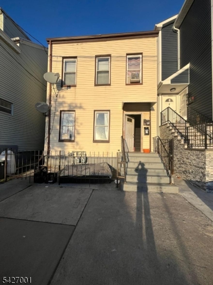 Investment or Owner-occupied opportunity with income potential. Two-family home with finished attic, close to hospitals, public transit, and shopping.