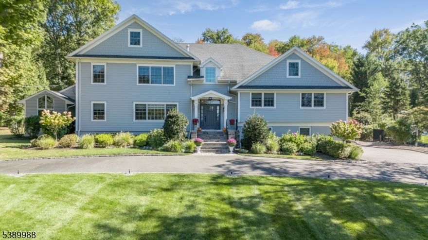 COME HOME TO 7 COVENTRY ROAD, a 5 Bedroom, 5.1 Bath perfectly renovated architectural dream. Following a major 2017 transformation, this residence showcases splendid design with intentional functionality. Majestic 2-story Entry Foyer welcomes with soaring vaulted ceiling, tremendous light, and gorgeous hardwood floors. Luminous Great Room with exposed beam and dramatic 2-sided fireplace wall lends well for both large and intimate gatherings. 1st Level also houses 2 Home Offices, perfect for today's work-from-home lifestyle. Well-appointed Chef's Kitchen, boasting white cabinetry with radiant under-lighting, quartz countertops, geometric glass accents, SS appliances, center island, generous Butler's Pantry, and easy-access to your own private paradise - a beautiful bluestone patio and expansive, meticulously maintained Backyard  also accessible from cozy adjacent Sunroom. Upstairs, 3 sizable Bedrooms await, including one Ensuite with attractive granite vanity. Your Primary Ensuite Bedroom is its own private sanctuary on the 3rd Level, with 2 walk-in closets, spacious Bathroom, Laundry Room  PLUS an inviting Sitting Room with its own covered balcony and Backyard view! Amazing storage solutions throughout keep everything organized. Lower Level offers 5th Bedroom with separate entrance, 2 Full Baths (1 with sauna), Mudroom, plus 2 huge Rec Rooms. Set on close to an acre, bordering preserved land/forest, great location, and comfortable luxury at its best!