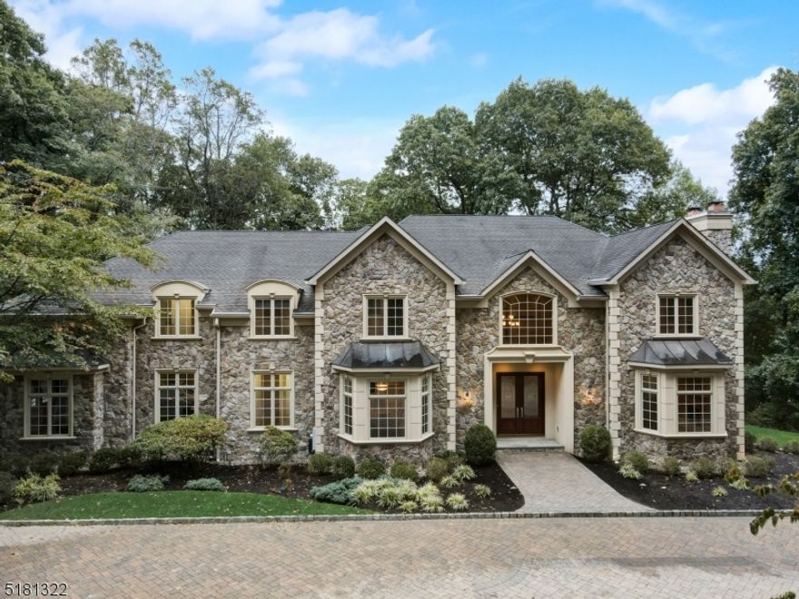 This once builder-owned 7,688 square foot 15-year young estate, situated on 6 acres, boasts an award-winning radiant floor heating system for maximum comfort and enjoyment. Built to impress, this home offers high-end appliances including sub-zero and bosch, a custom-made free floating staircase, a primary bedroom suite with FP, bar/fridge, a spa tub, and dual showers with steam. Four bedrooms with walk-in closets and attached bathrooms, a large bonus/game room, two laundry rooms as well as a first-floor full bed/bathroom. Close to NYC, excellent schools ranked 57th in the state, a home warranty plan for worry-free ownership, lifetime warranty from gutter helmet, a walkout patio and a hot tub. Nothing has been overlooked in this exquisite home!